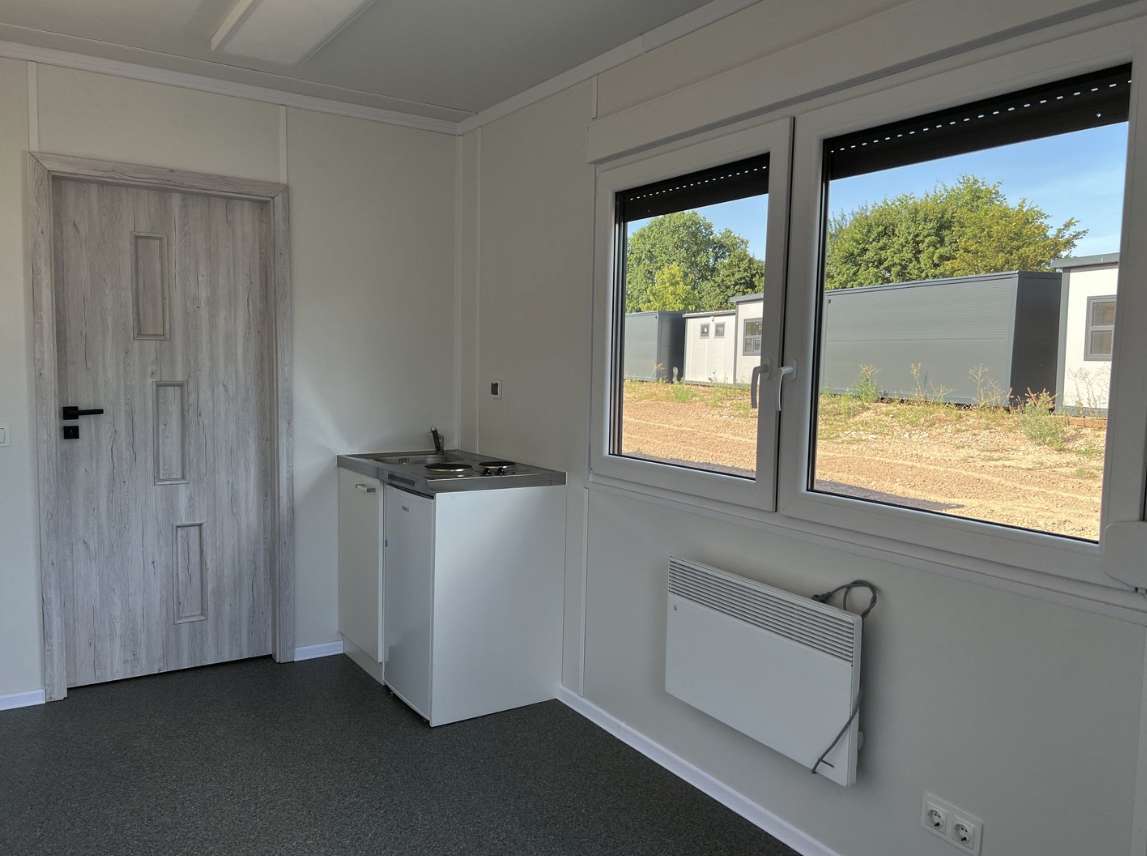 Conteneur résidentiel 6,00 × 2,44 m – Avec cuisine, salle de bain et douche
