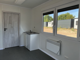 Conteneur résidentiel 6,00 × 2,44 m – Avec cuisine, salle de bain et douche