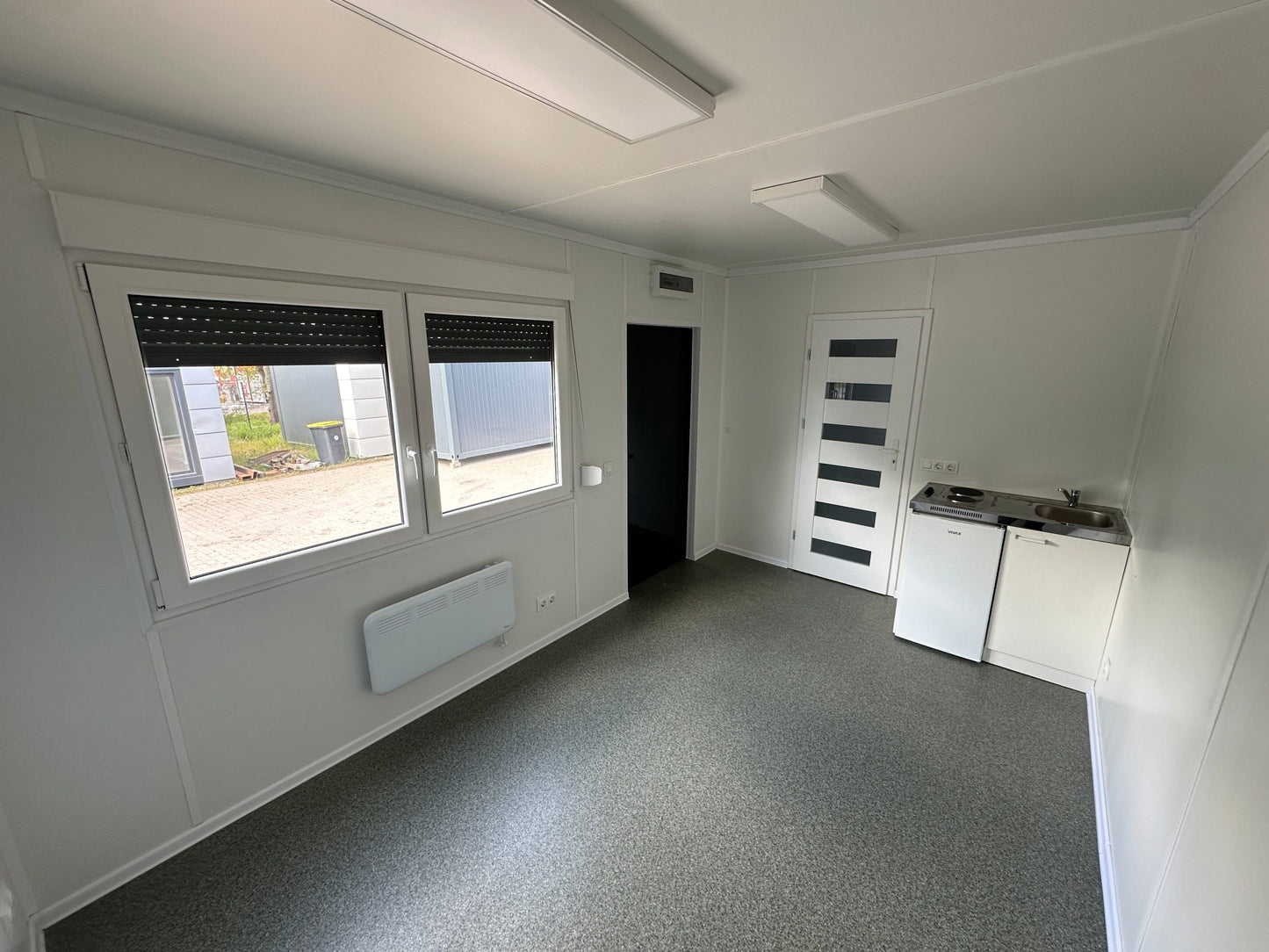 Container abitativo 6,00 × 3,00 m – Con cucina, bagno e doccia