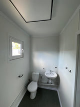 Container abitativo 6,00 × 3,00 m – Con cucina, bagno e doccia